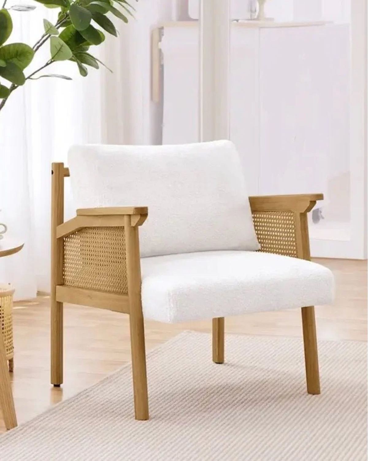 Cream boucle upholstered armchair with natural rattan frame, modern design from Starlight Express in furniture and mirrors collection.