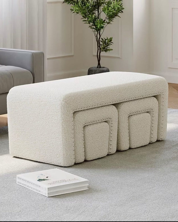 Cream boucle five-piece foot stool set from Starlight Express featuring stylish, comfortable upholstered stools for living room decor.