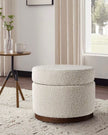 Cream boucle round storage foot stool from Starlight Express, featuring soft fabric and a compact, functional design.