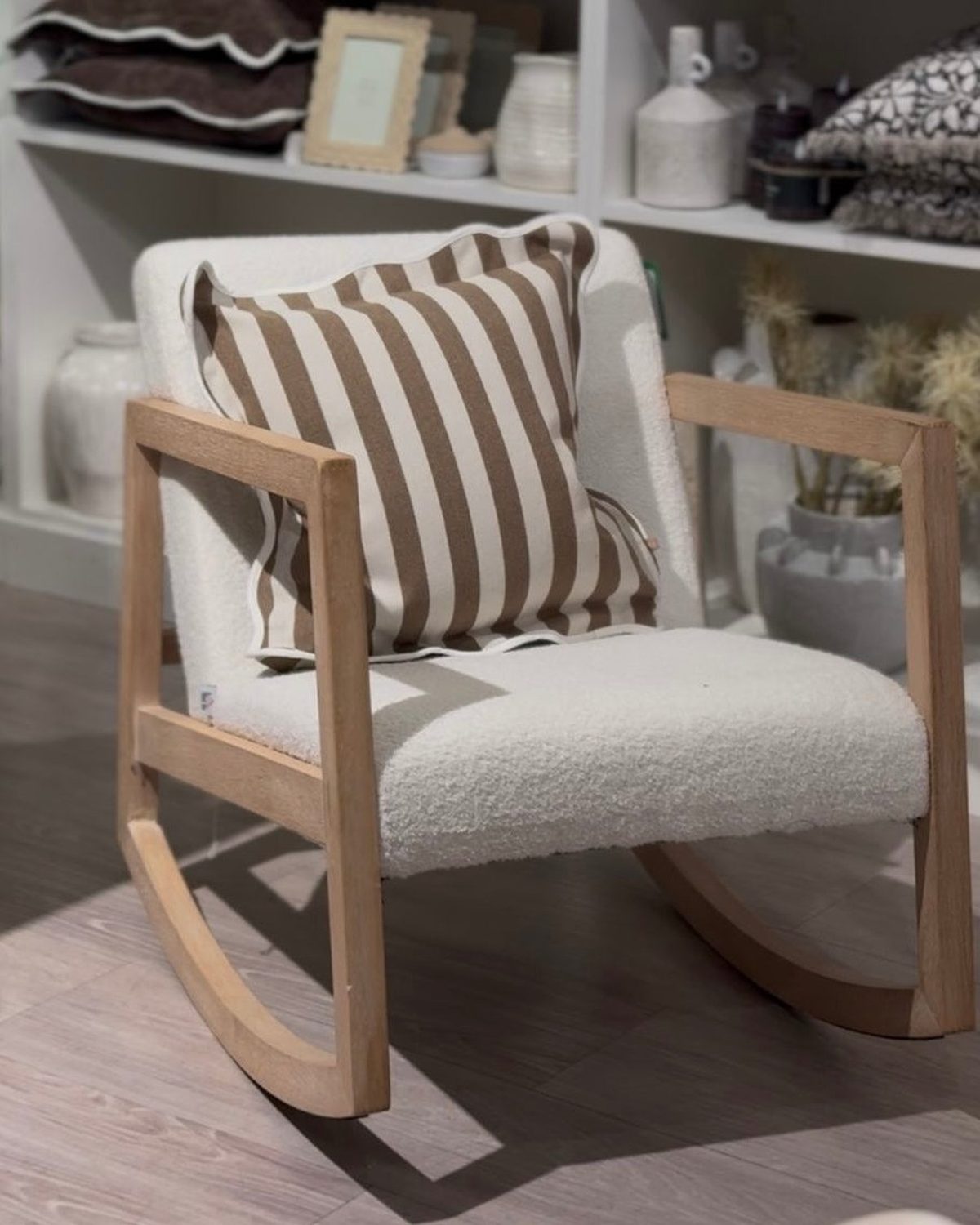 Cream boucle Sherpa rocking chair by Starlight Express, cozy nursery and bedroom furniture with plush fabric and wooden rocking base.