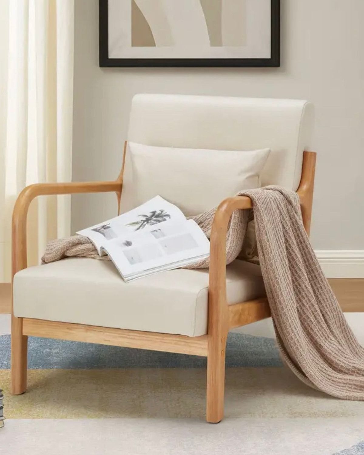 Cream retro wooden framed arm chair by Starlight Express, showing a cozy, vintage-style furniture piece with plush cushioning.