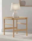 Natural wood and bamboo side table by Starlight Express, featuring a sleek design and sturdy construction for modern furniture decor.