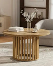 Rustic natural open slatted round wood coffee table by Starlight Express, showcasing its round shape and open slatted design in a furniture setting.