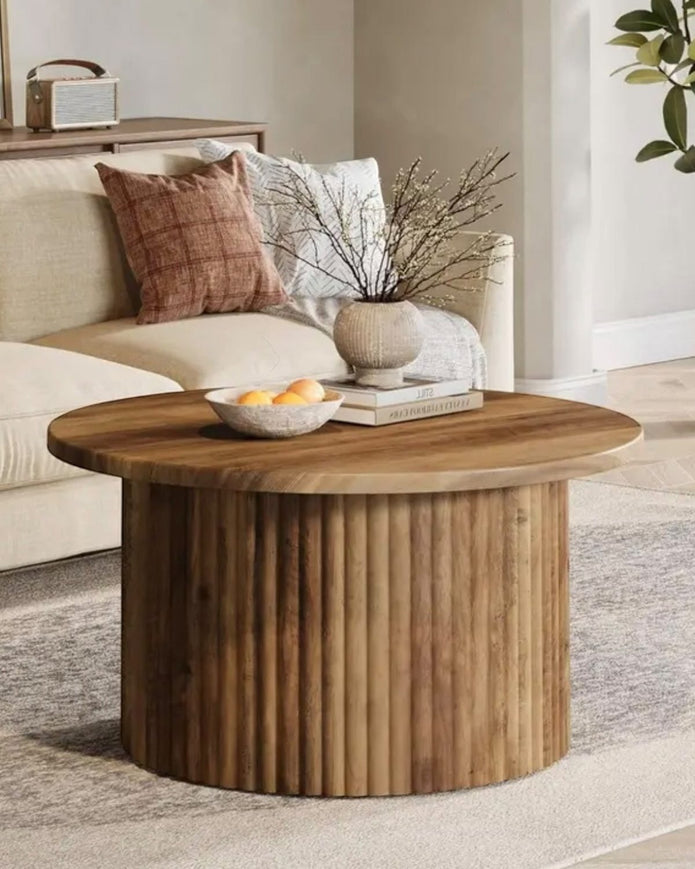Rustic natural round closed slatted wood coffee table by Starlight Express, featuring a sturdy wooden surface and slatted design.