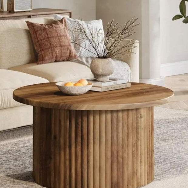 Rustic natural round closed slatted wood coffee table by Starlight Express, featuring a sturdy wooden surface and slatted design.