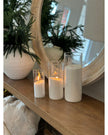Set of three Starlight Express hurricane glass candle holders for elegant home decor, featuring clear glass and classic design.