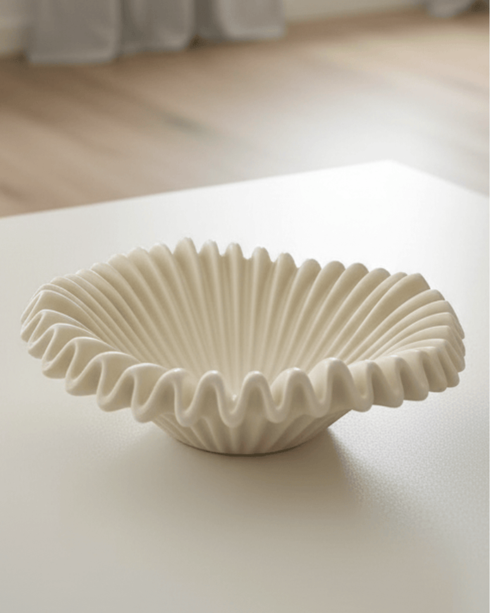 Small Barbuda Cream Wavy Bowl by Starlight Express, decorative ceramic home decor piece with a cream finish and wavy design.