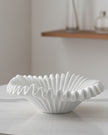 Small Barbuda white wavy bowl by Starlight Express, a stylish ceramic home decor piece with a smooth, wavy design.