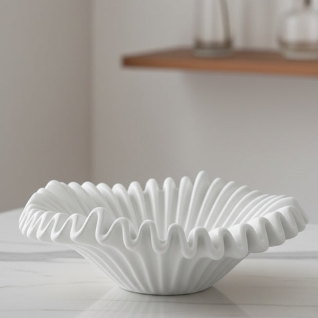 Small Barbuda white wavy bowl by Starlight Express, a stylish ceramic home decor piece with a smooth, wavy design.