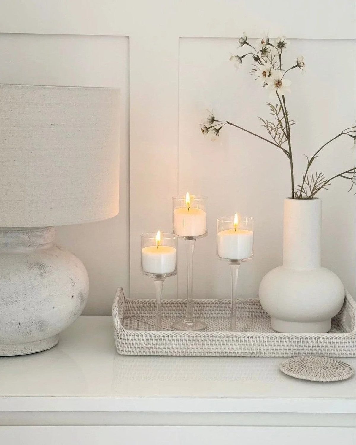 Set of three stemmed glass candle holders for home decor by Starlight Express, featuring elegant transparent glass designs.