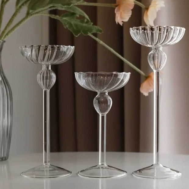 Set of three Starlight Express stemmed glass fluted candle holders for elegant home decor display.