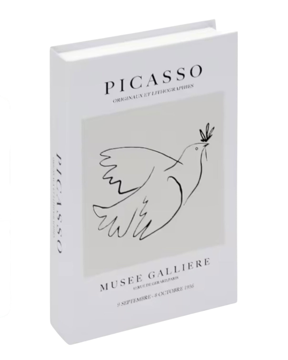 White and black Picasso-style storage book box by Starlight Express, ideal for home decor and organization.