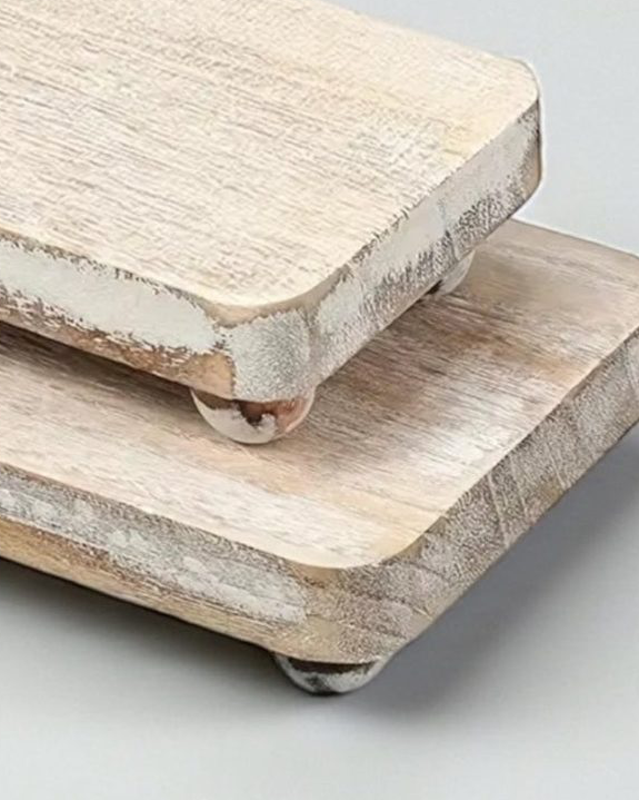 Set of two white wood chunky risers for home décor, featuring natural wood finish and sturdy block design.