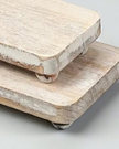Set of two white wood chunky risers for home décor, featuring natural wood finish and sturdy block design.