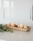 Starlight Express wooden dough bowl kitchen tray used as a stylish home decor piece with a rustic wooden finish.