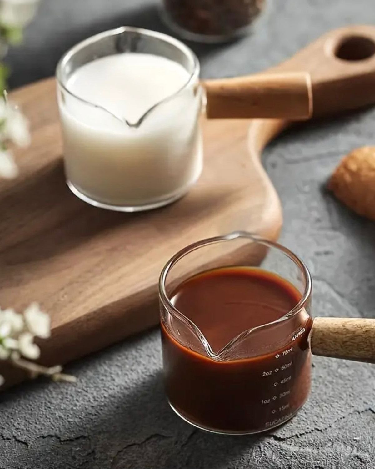 Glass milk and coffee jug pourer with wooden handle by Starlight Express, ideal for kitchen and dining use