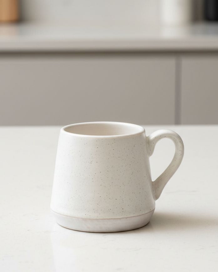 Set of two natural ceramic espresso cups by Starlight Express, ideal for stylish kitchen and dining use.