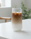 Ribbed glass iced coffee cup by Starlight Express, clear kitchen and dining drinkware for cold beverages.