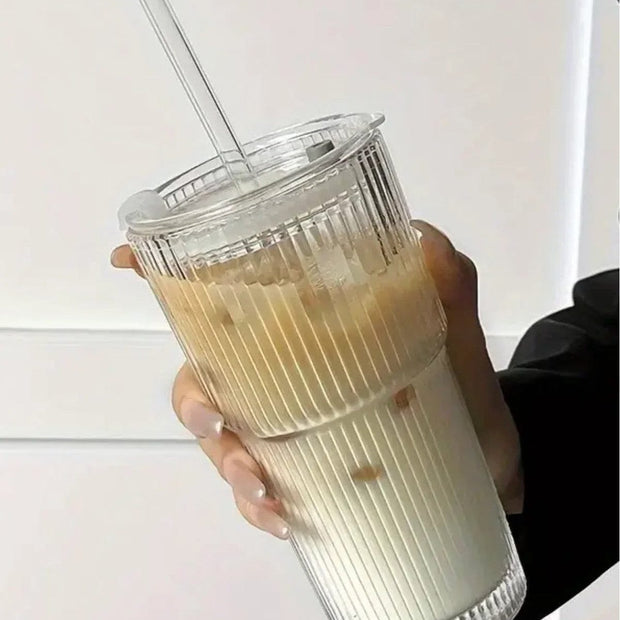 Tall ribbed glass travel coffee mug by Starlight Express, designed for hot beverages and easy on-the-go use.