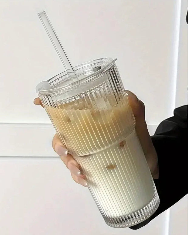 Tall ribbed glass travel coffee mug by Starlight Express, designed for hot beverages and easy on-the-go use.