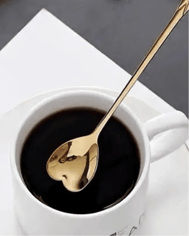 Gold heart-shaped latte coffee spoon from Starlight Express, perfect for kitchen and dining use.