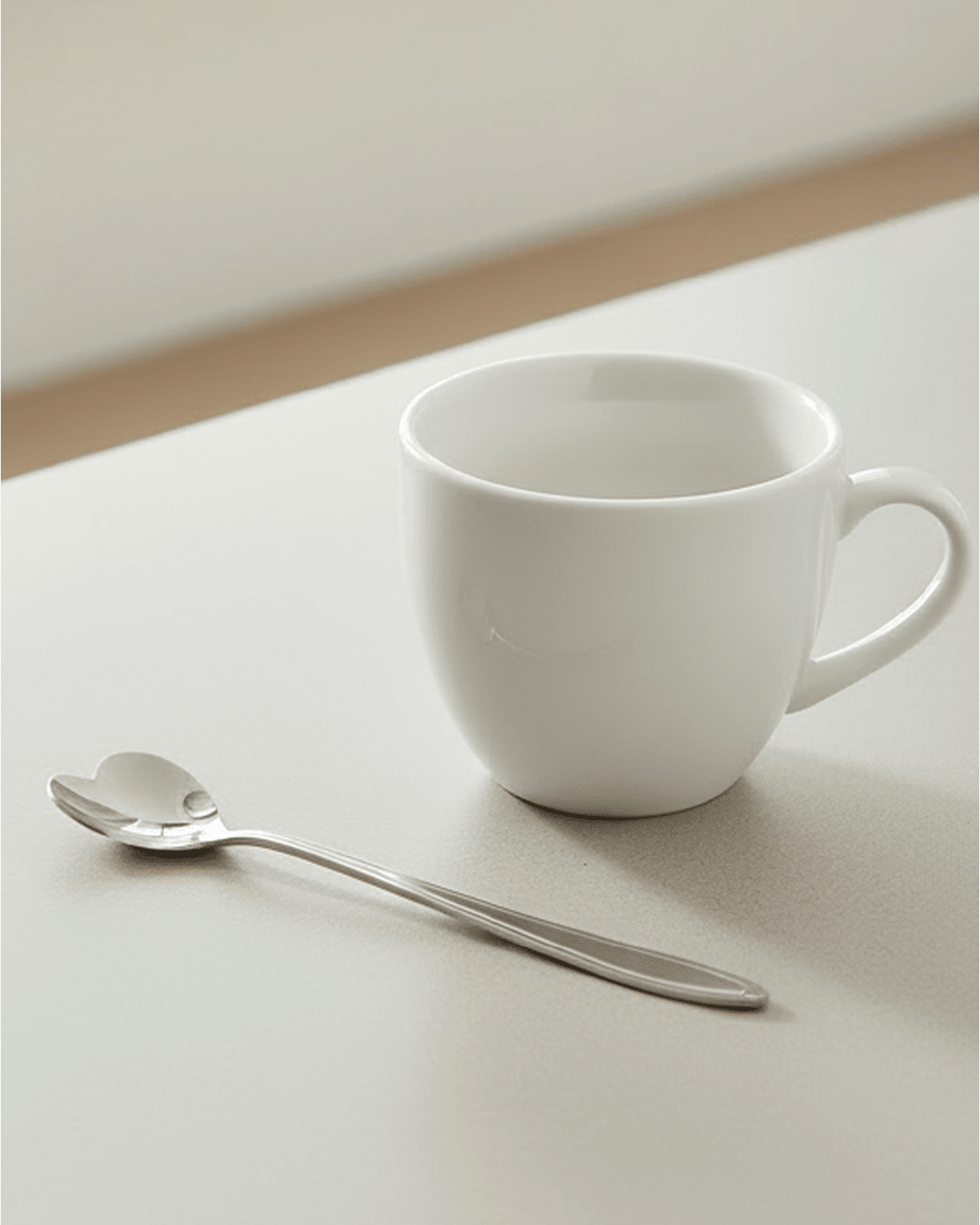 Silver hearts latte coffee tea spoon from Starlight Express, elegant kitchen utensil for stirring beverages.