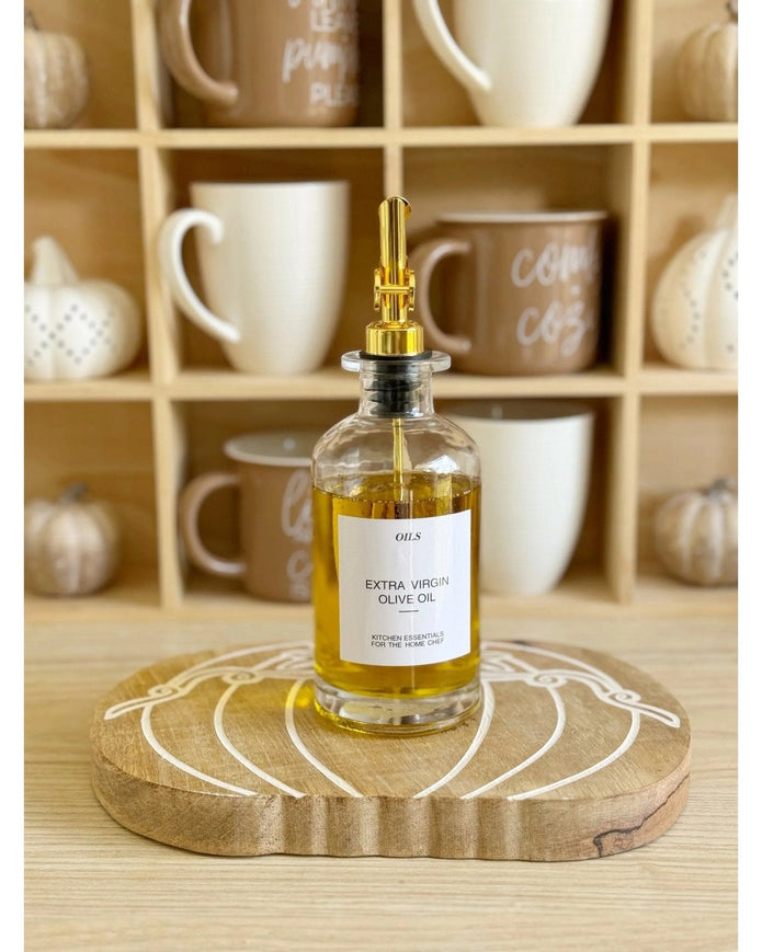 Starlight Express gold coffee syrup and oil pourer dispenser bottle for kitchen and dining use, featuring a sleek design.