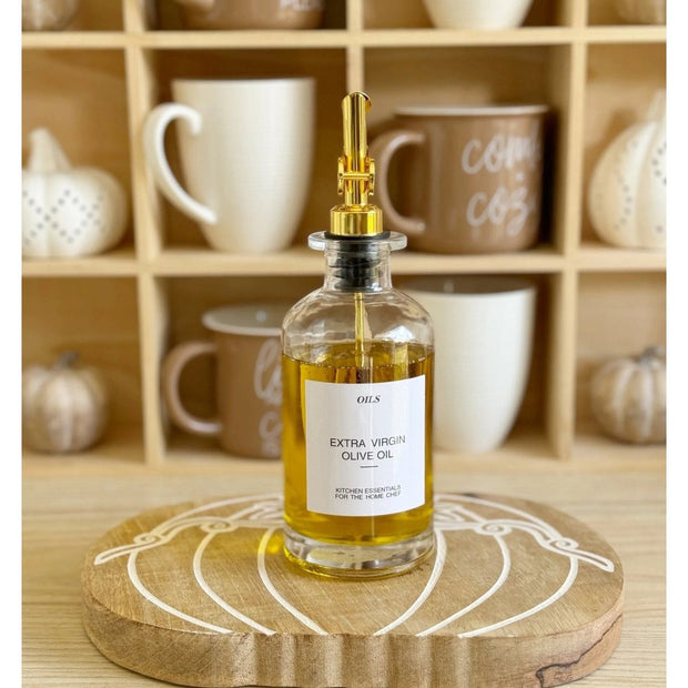 Starlight Express gold coffee syrup and oil pourer dispenser bottle for kitchen and dining use, featuring a sleek design.