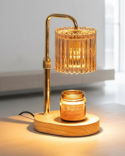 Clear glass ribbed candle warmer lamp by Starlight Express with safe flameless timer, designed for gentle, decorative lighting.