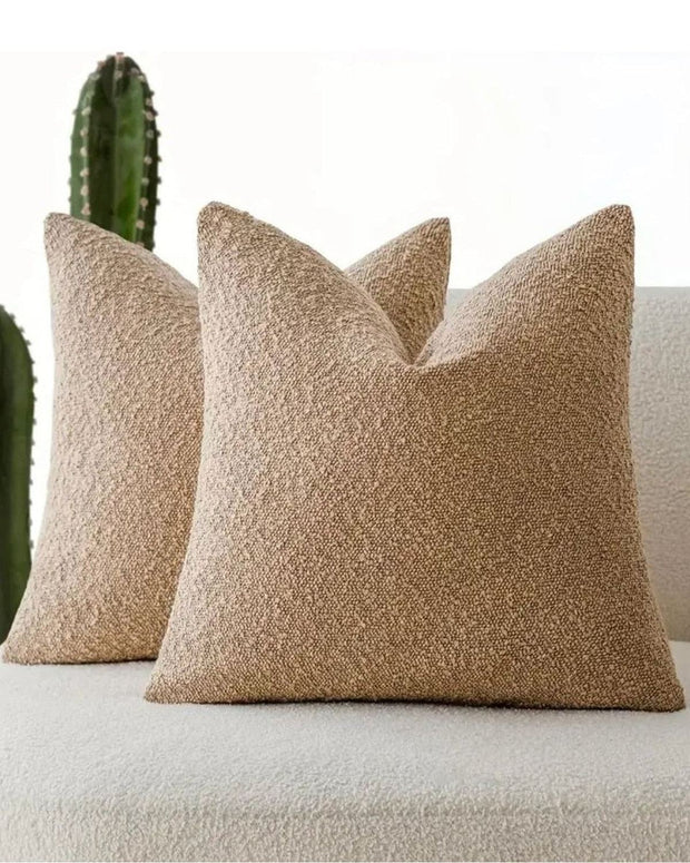 Beige boucle cushion cover from Starlight Express, soft furnishing with textured fabric and cozy design.