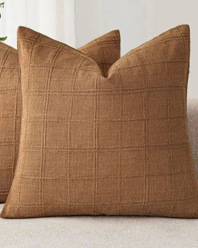 Caramel brown woven square design cushion cover from Starlight Express, soft furnishings with textured pattern and cozy appearance.