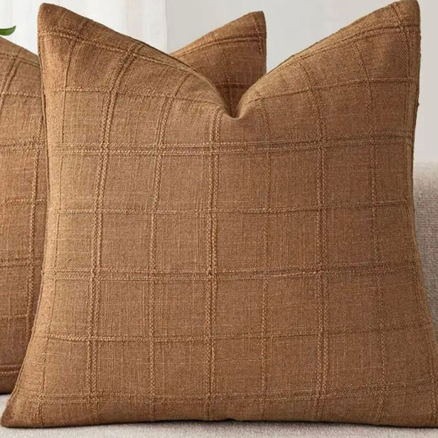 Caramel brown woven square design cushion cover from Starlight Express, soft furnishings with textured pattern and cozy appearance.