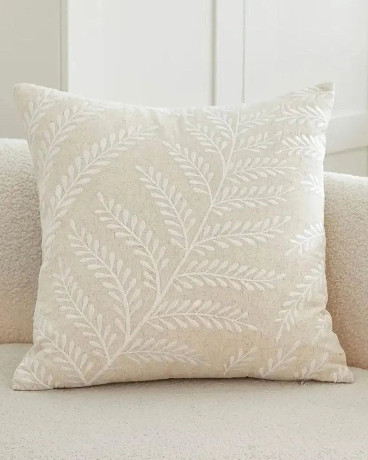 Cream fern embroidered cushion cover from Starlight Express, soft furnishings with detailed floral embroidery.