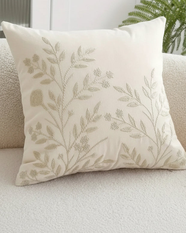 Cream floral embroidered cushion cover by Starlight Express, soft furnishings with intricate flower embroidery and plush fabric.