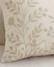 Cream floral embroidered cushion cover from Starlight Express, soft furnishings with intricate floral embroidery on fabric.