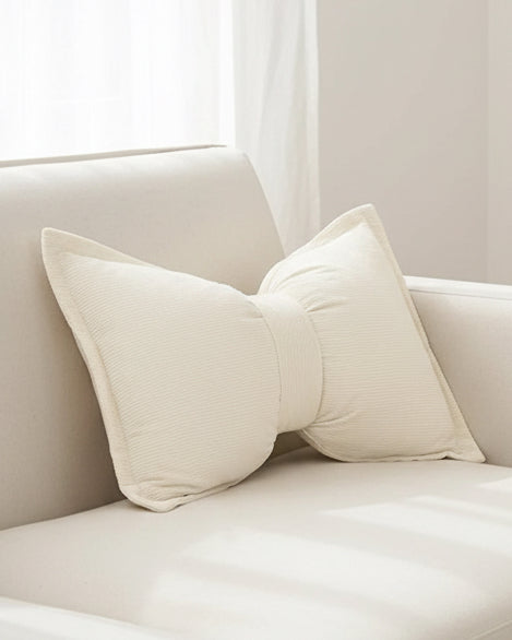 Cream neutral corduroy striped bow cushion by Starlight Express, soft furnishings with a cozy, stylish design and bow detail.