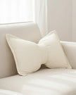 Cream neutral corduroy striped bow cushion by Starlight Express, soft furnishings with a cozy, stylish design and bow detail.
