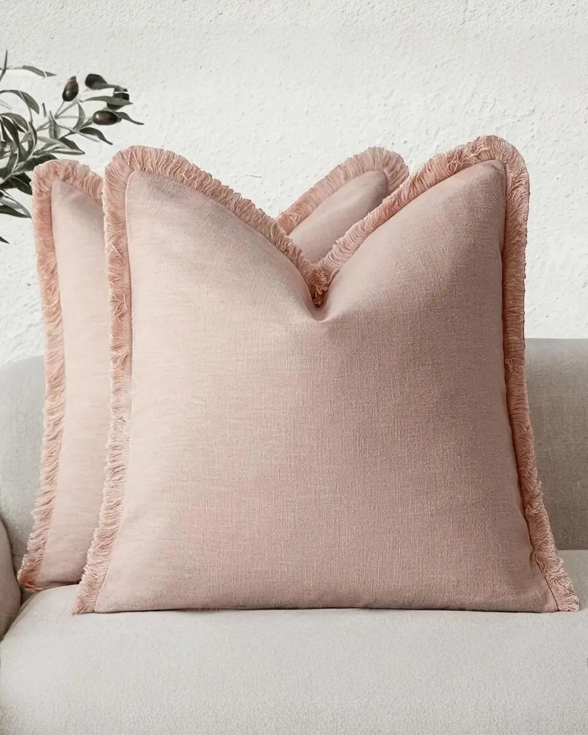 Pink cushion cover with frayed edges from Starlight Express, soft furnishings, featuring a stylish, textured design.