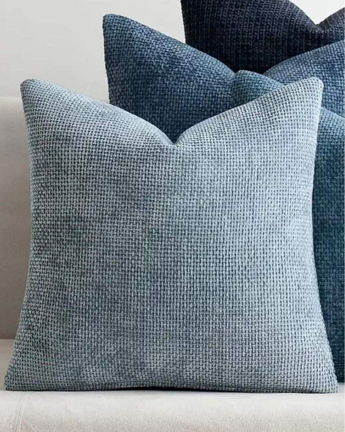 Ocean blue woven design cushion cover from Starlight Express, soft furnishings with textured fabric and decorative pattern.