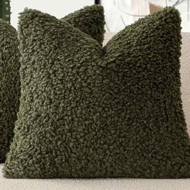 Olive green boucle cushion cover by Starlight Express, soft furnishings with textured fabric and cozy design.