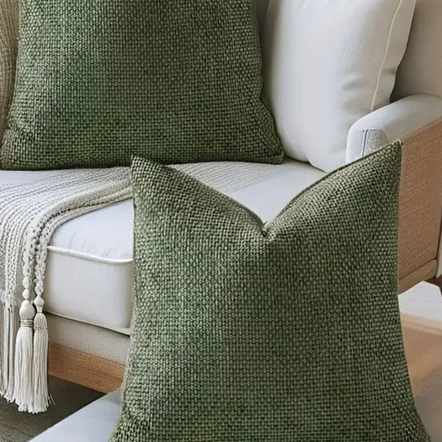 Olive green chenille cushion cover from Starlight Express, soft furnishings with textured fabric and cozy appearance.