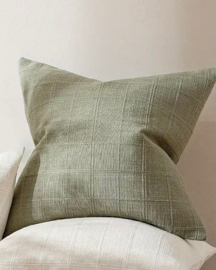 Denim blue woven square cushion cover with a textured design, ideal for soft furnishings and home decor.
