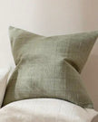 Denim blue woven square cushion cover with a textured design, ideal for soft furnishings and home decor.