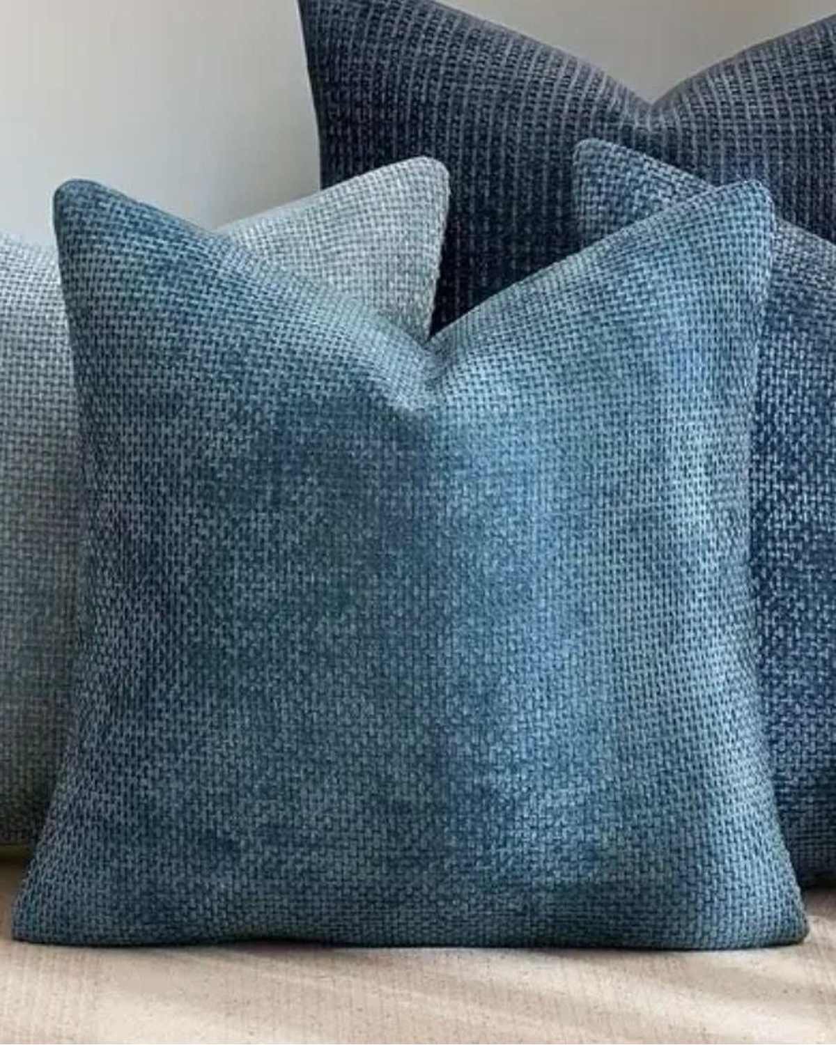 Teal blue woven design cushion cover by Starlight Express, soft furnishings, with textured fabric and decorative woven pattern.