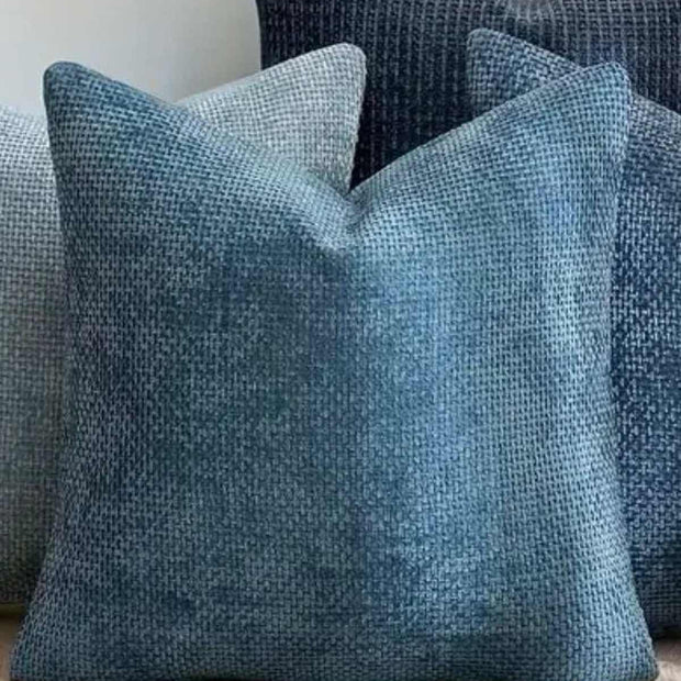 Teal blue woven design cushion cover by Starlight Express, soft furnishings, with textured fabric and decorative woven pattern.