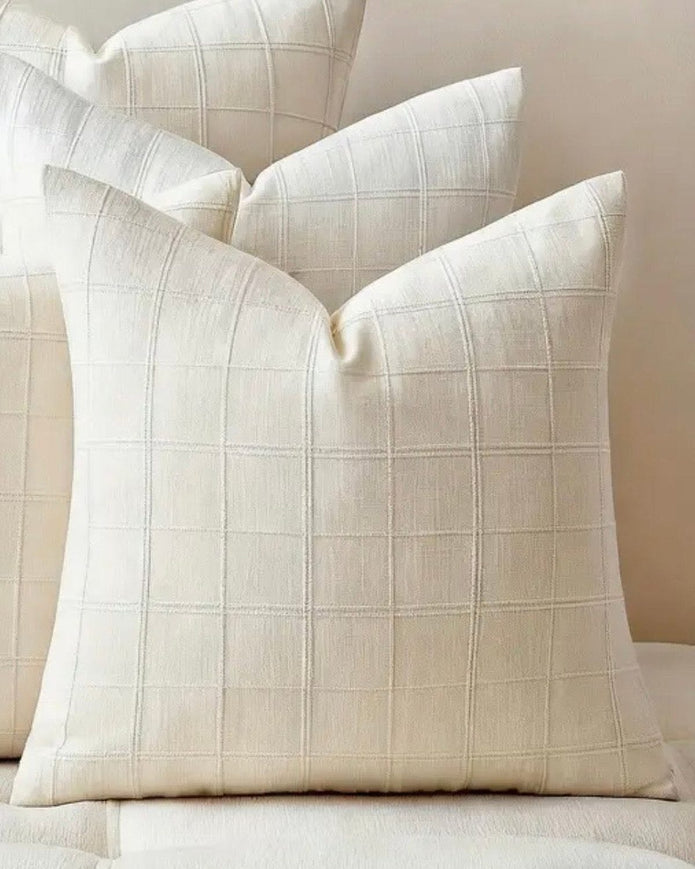 White neutral woven cushion cover with square design from Starlight Express, perfect for soft furnishings and home decor.
