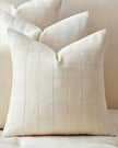 White neutral woven cushion cover with square design from Starlight Express, perfect for soft furnishings and home decor.