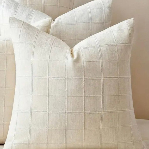 White neutral woven cushion cover with square design from Starlight Express, perfect for soft furnishings and home decor.