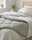 Sage green floral queen-sized quilt by Starlight Express, soft furnishings with intricate floral pattern and cozy fabric.