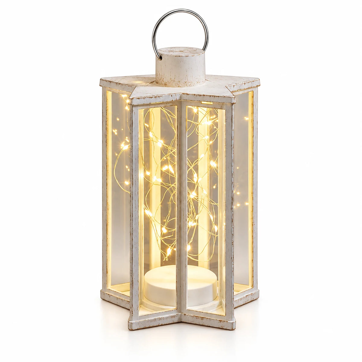 Full studio view of the cream star-shaped Starlight lantern with warm lights.